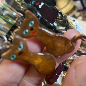 Clay brown cats with green eyes dangled earrings. Handpainted and crafted